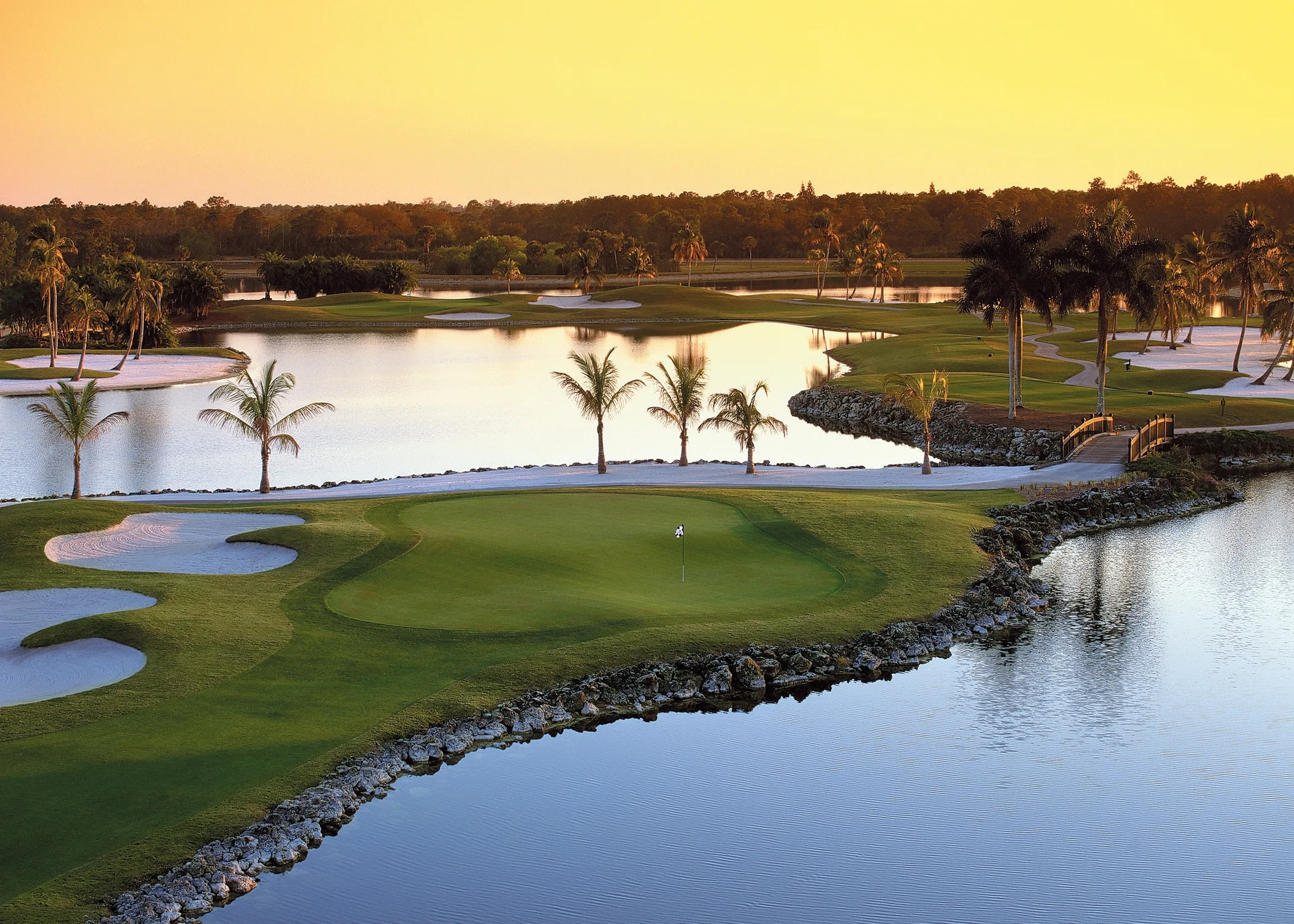 Lakeside green at sunset at Lely Resort Golf and Country Club, Naples.