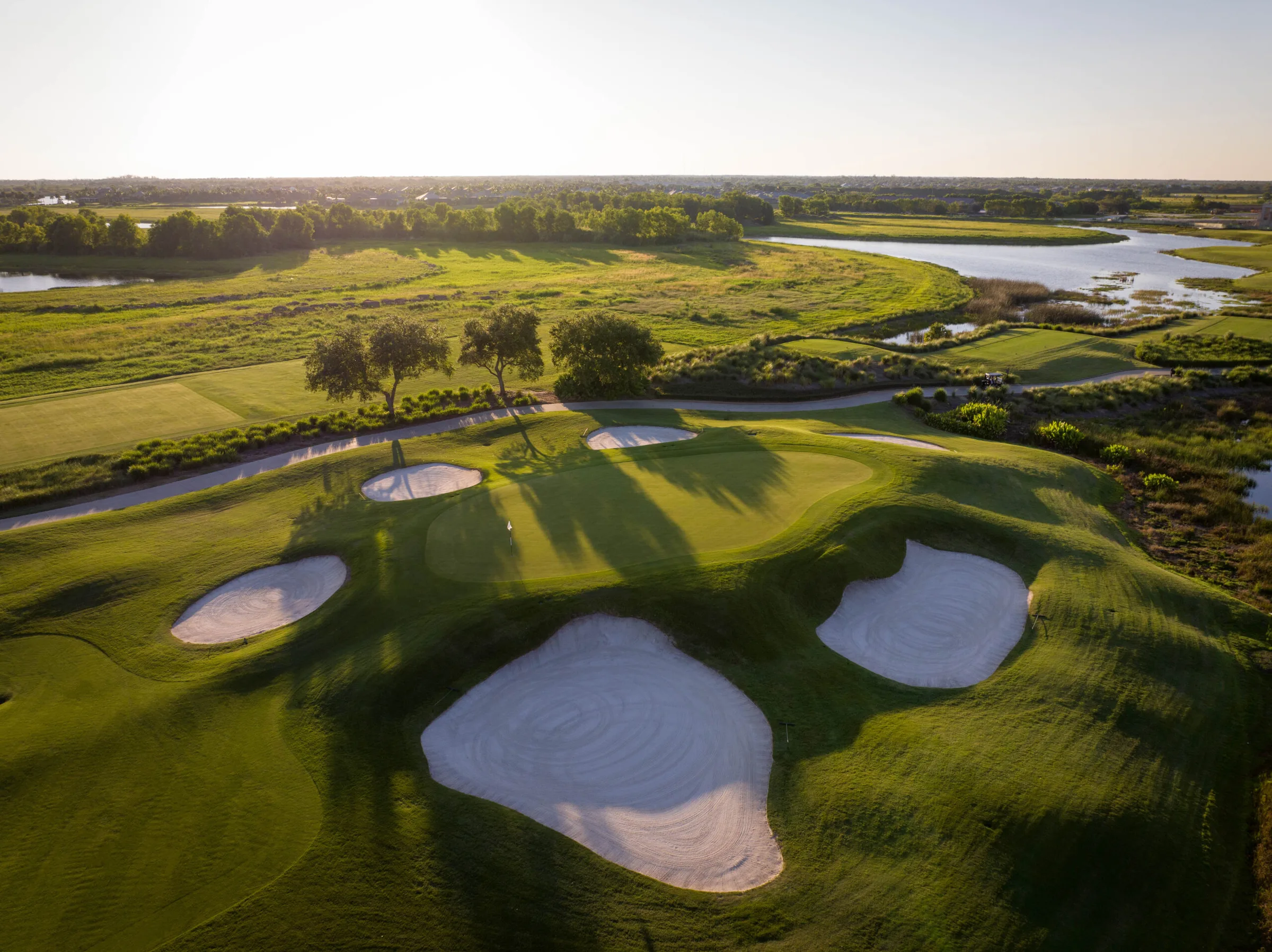 Aerial view of a bunkered green on the Fiddler's Creek golf course, Naples.