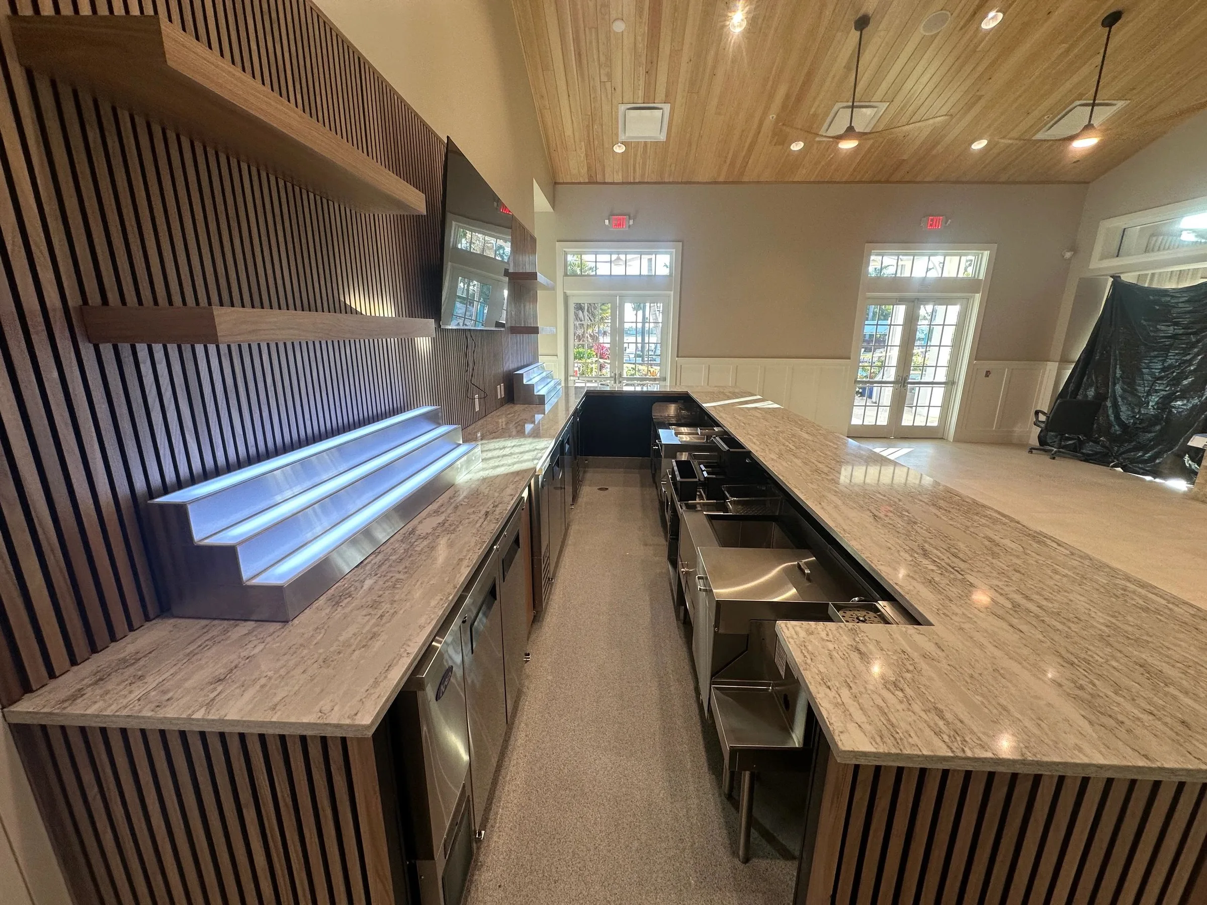 Bar and lounge seating inside The Reserve Club at Naples Reserve, Naples.