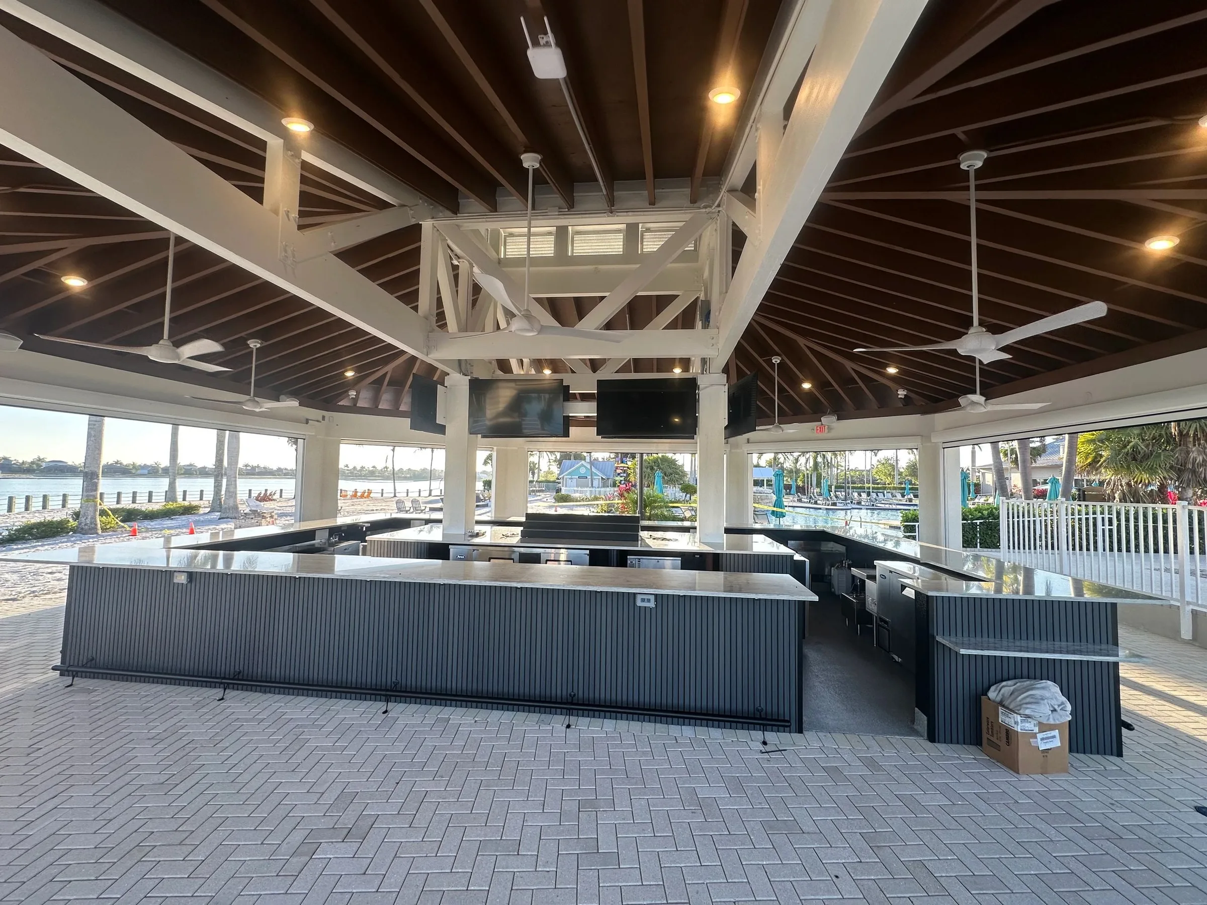 Covered lakeside pavilion and bar at The Reserve Club, Naples Reserve, Naples.