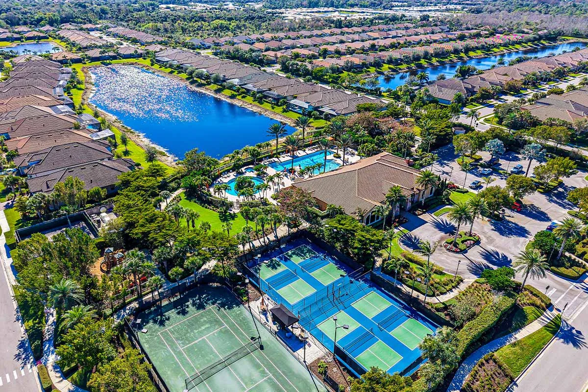 Aerial amenity campus at Esplanade at Hacienda Lakes (official HOA site).