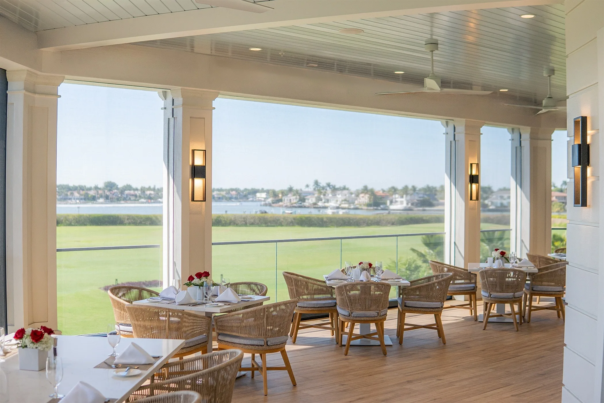 Covered outdoor veranda dining at Windstar on Naples Bay (official).