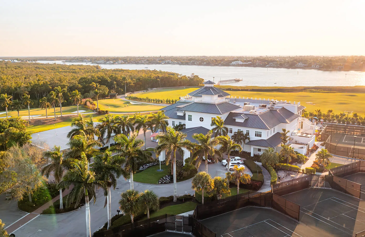 Aerial view of the Windstar clubhouse and golf course beside Naples Bay, Naples.