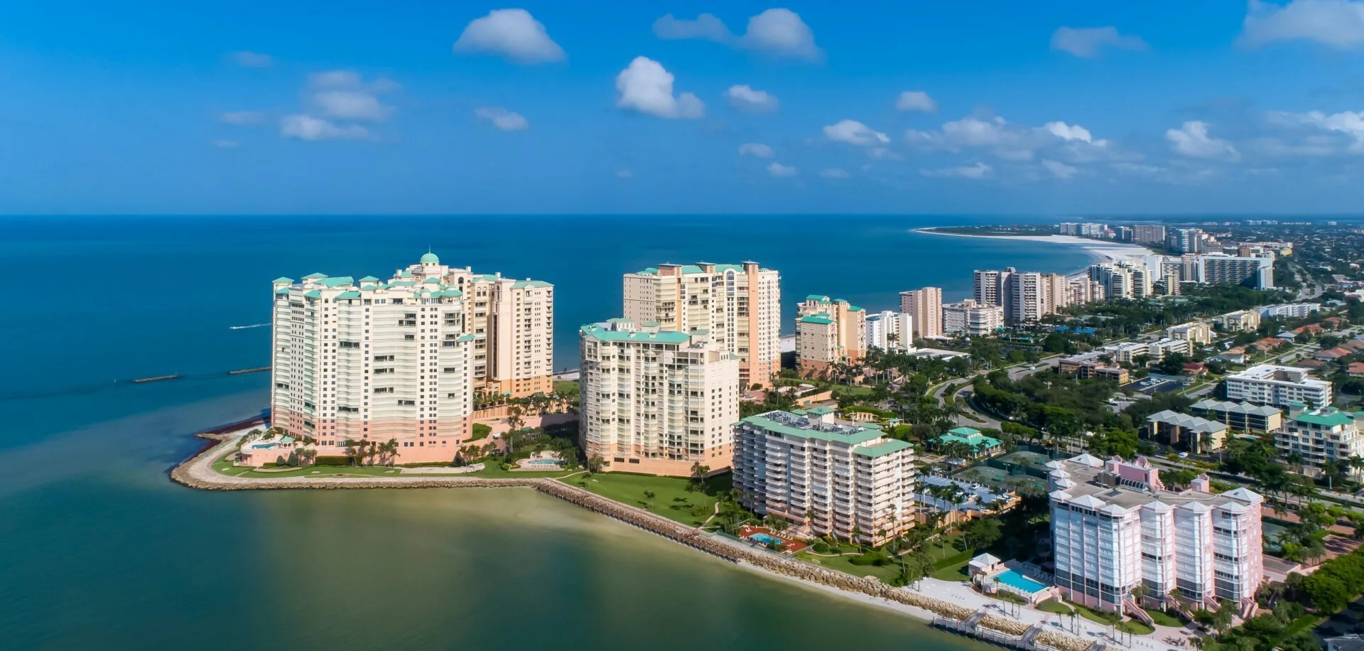 Aerial of the Cape Marco towers along the Gulf beach, Marco Island (official Cape Marco association sites).