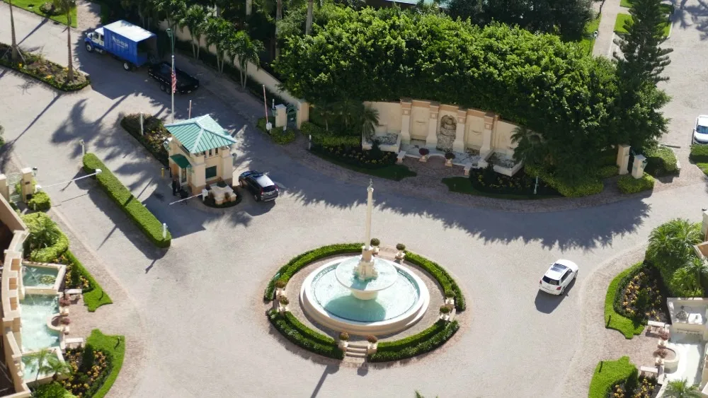 Aerial of the Cape Marco entrance fountain circle and gatehouse, Marco Island (official Cape Marco association sites).