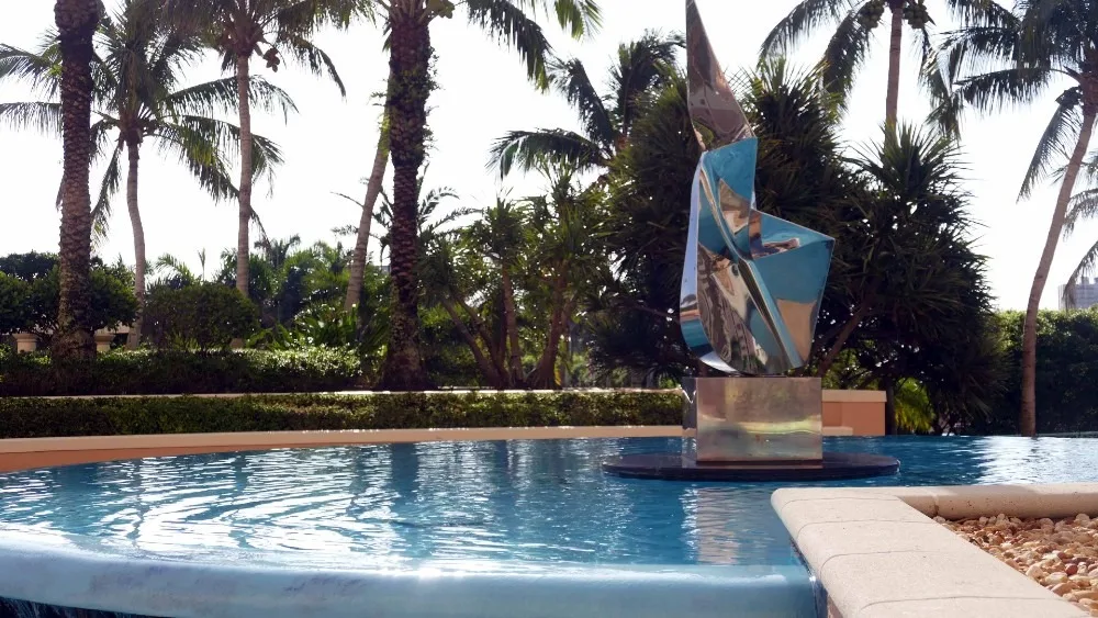 Pool with sculpture fountain at Cape Marco, Marco Island (official Cape Marco association sites).