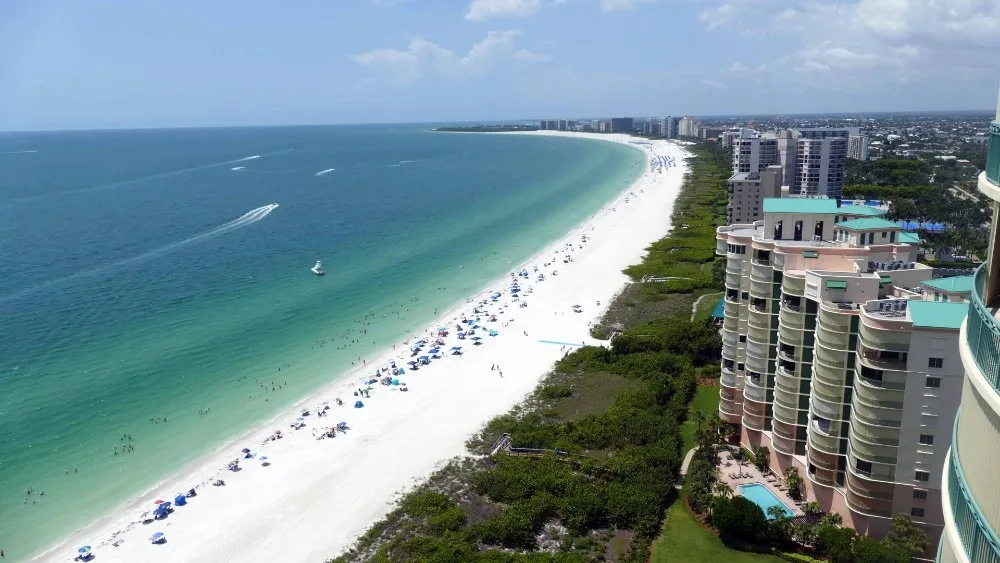 Gulf beach and tower view at Cape Marco, Marco Island (official Cape Marco association sites).