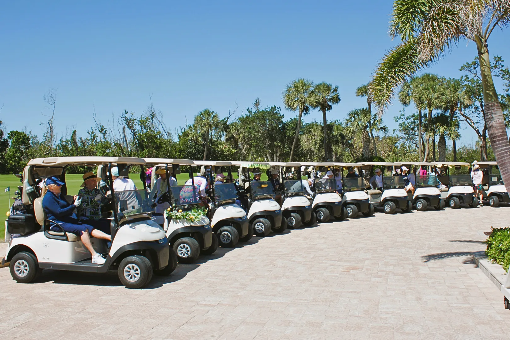 Lined golf carts at The Sanctuary Golf Club, Sanibel (official club site).
