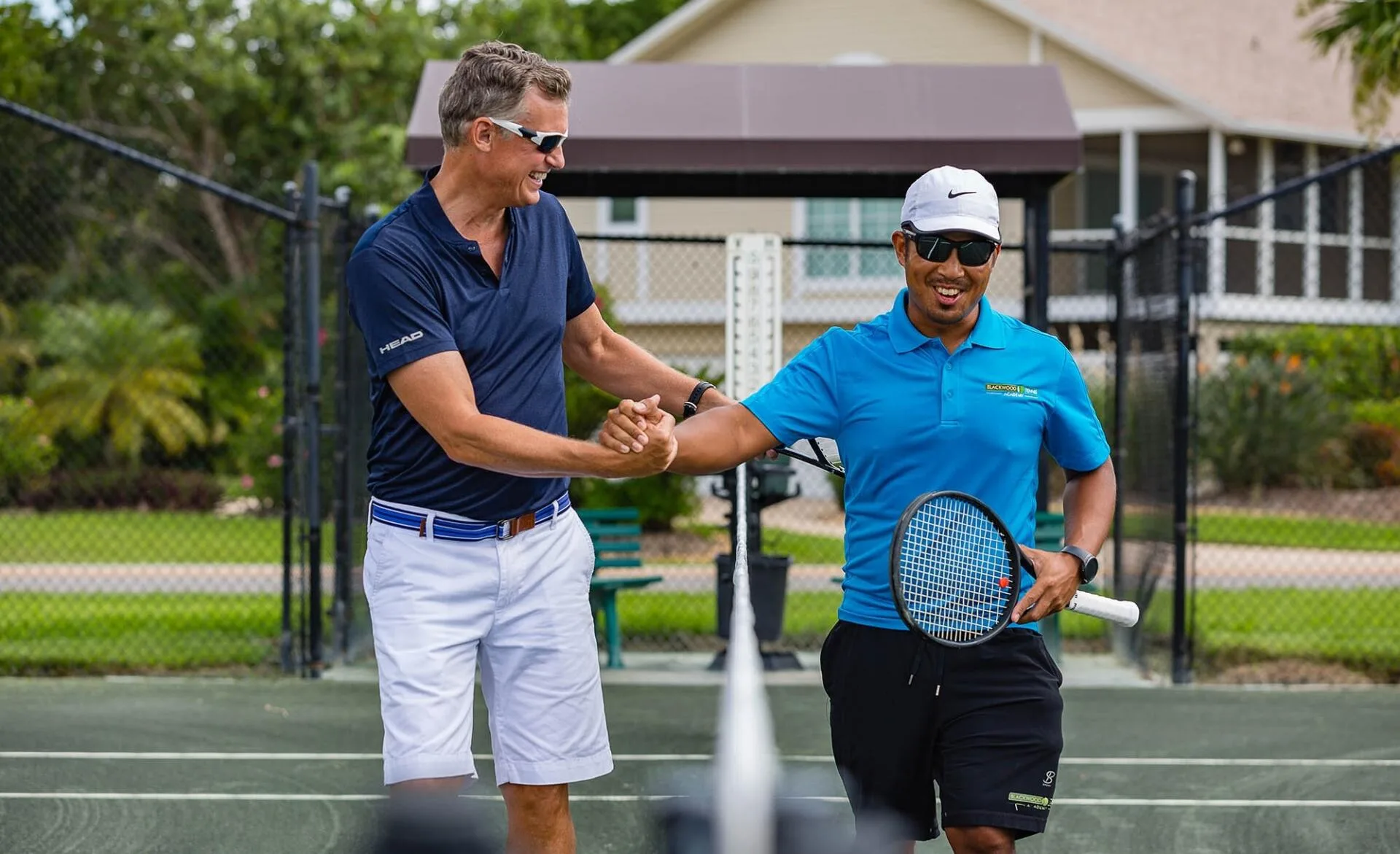 Tennis court amenity at The Dunes Golf and Tennis Club, Sanibel (official).