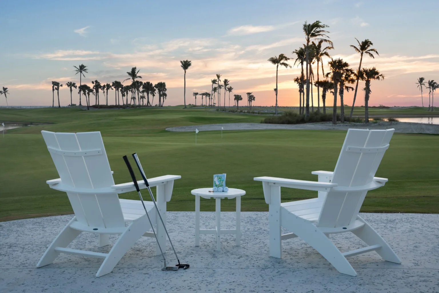 Sunset beach chairs along the Gulf at South Seas (official resort site).