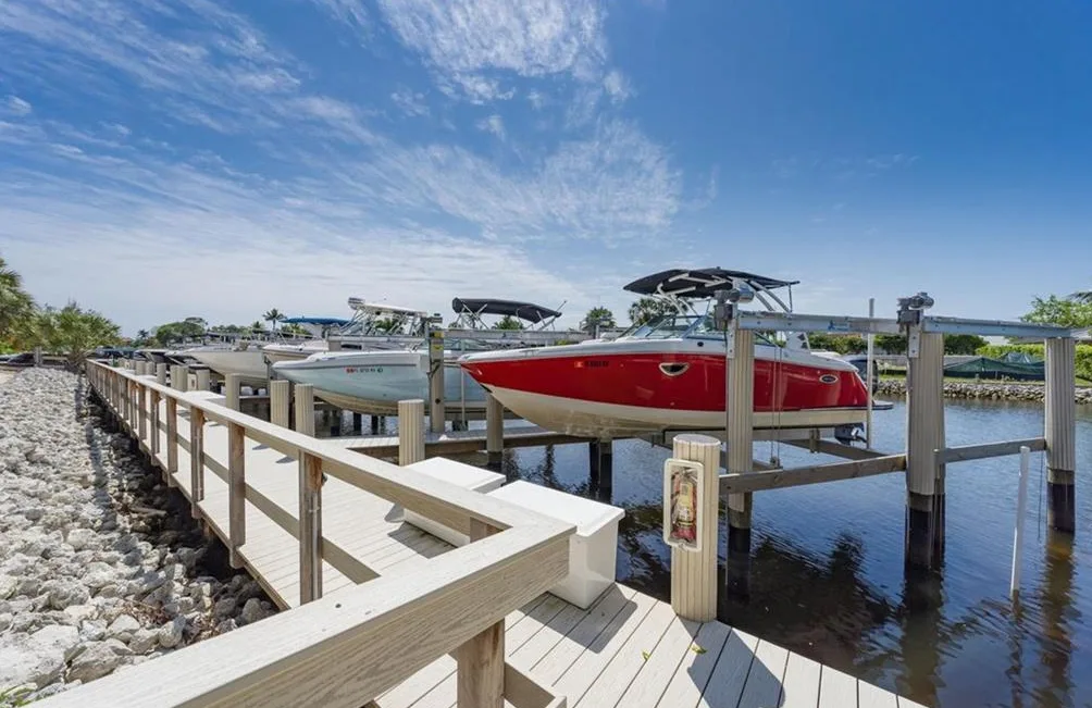 Boat dock with lifts on a canal