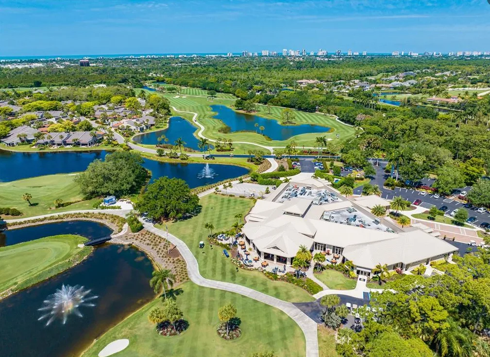 Aerial of the Bear's Paw clubhouse, golf course, lakes and fountains