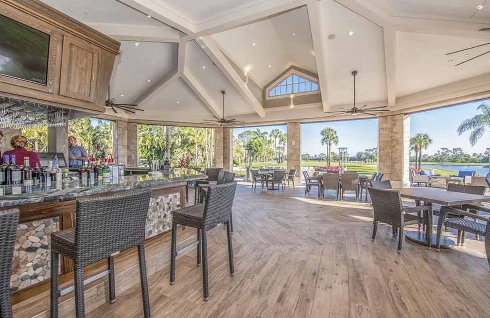 Open-air bar and terrace overlooking the golf course at Bear's Paw