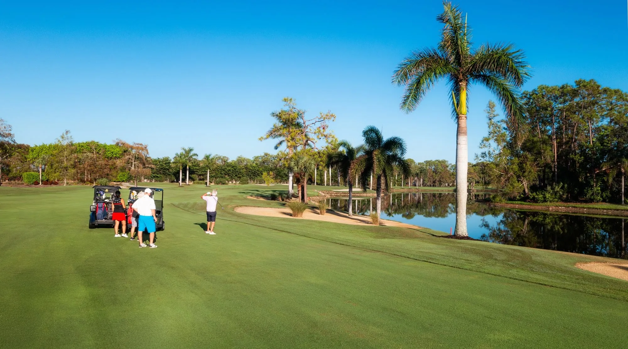 Fairway bunker and lake view at Royal Wood Golf and Country Club (official).