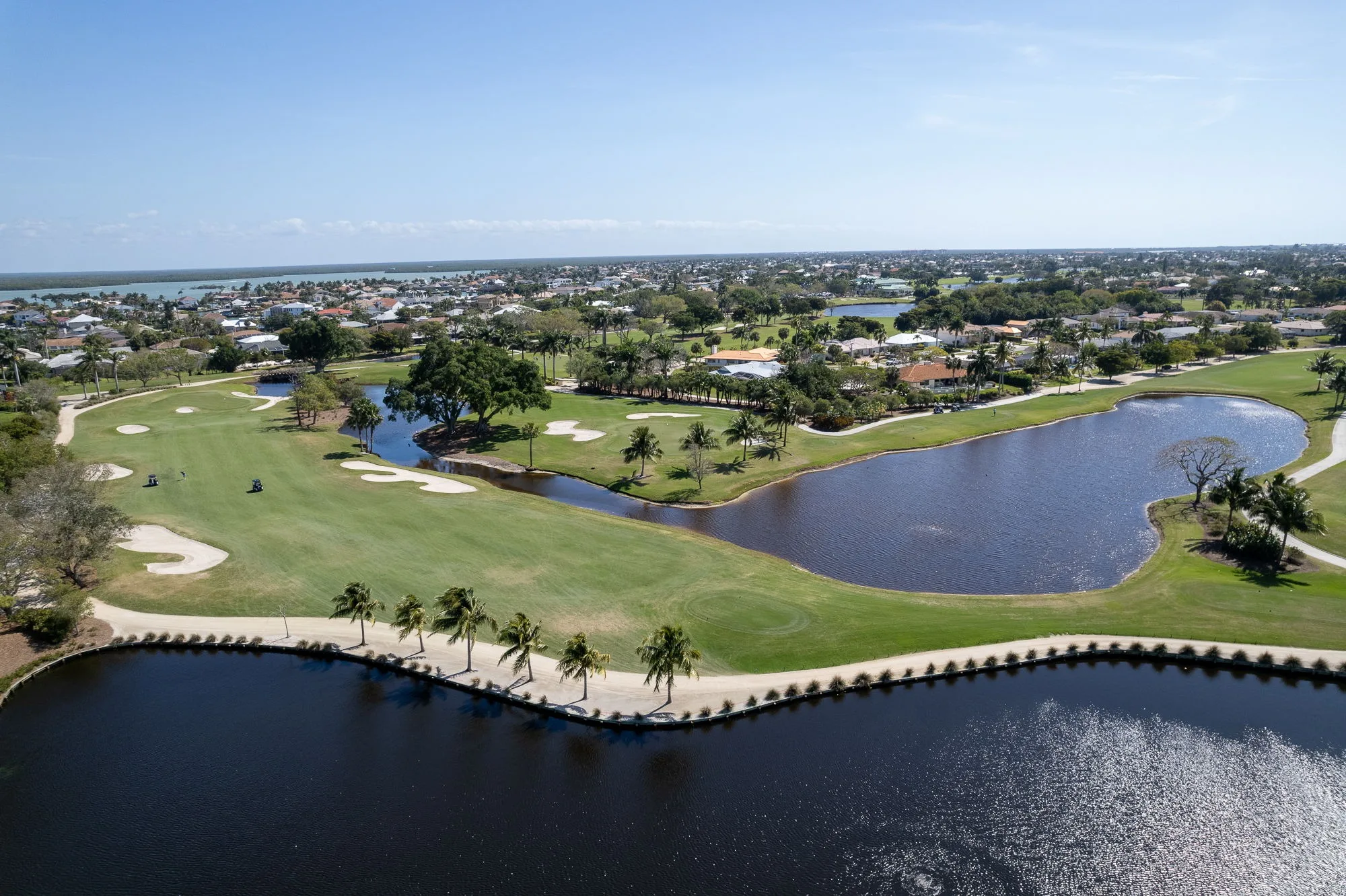Aerial view of Island Country Club golf course and water hazard (official club site).