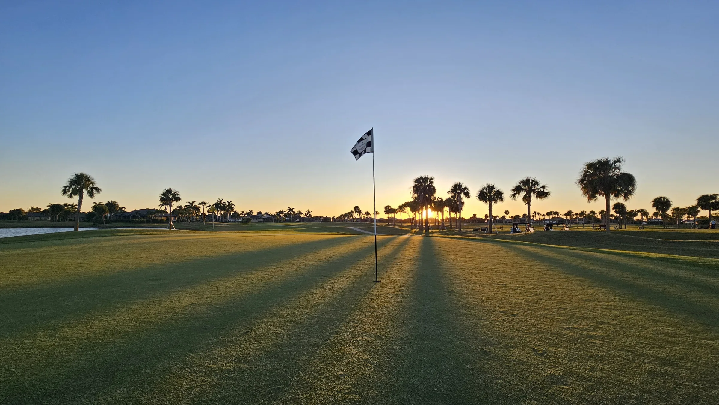 Flagstick at sunrise at Cape Royal Golf Club, Cape Coral (official club site).