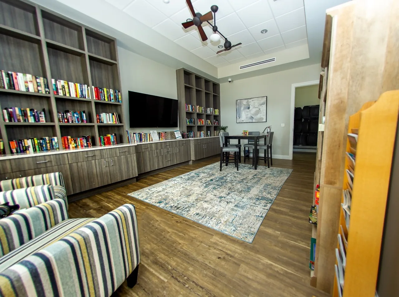 Library lounge inside the Sandoval community center, Cape Coral (official community site).
