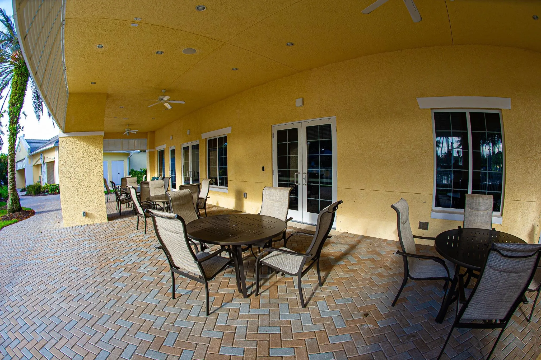 Covered lanai seating at the Sandoval community center, Cape Coral (official community site).