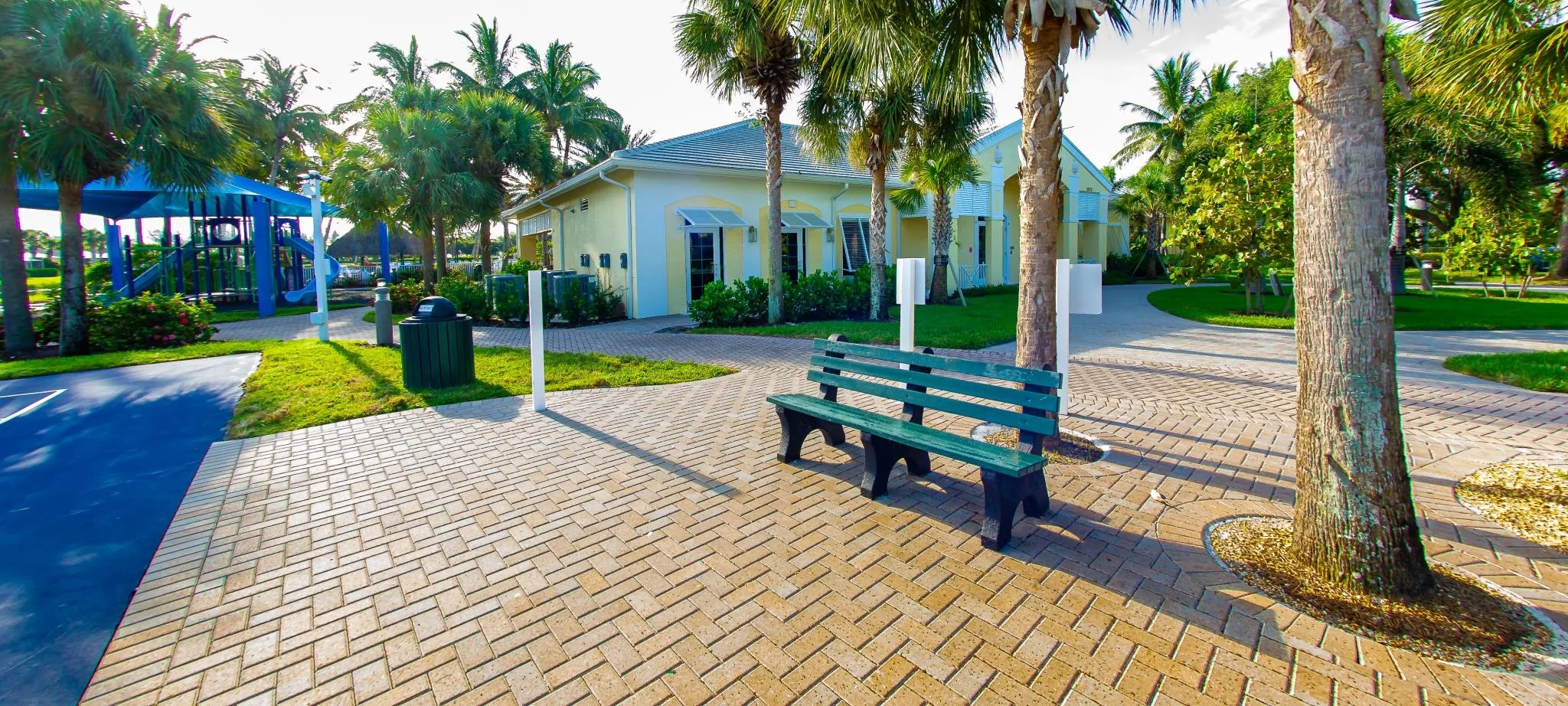 Shaded walkway and benches at the Sandoval community center, Cape Coral (official community site).