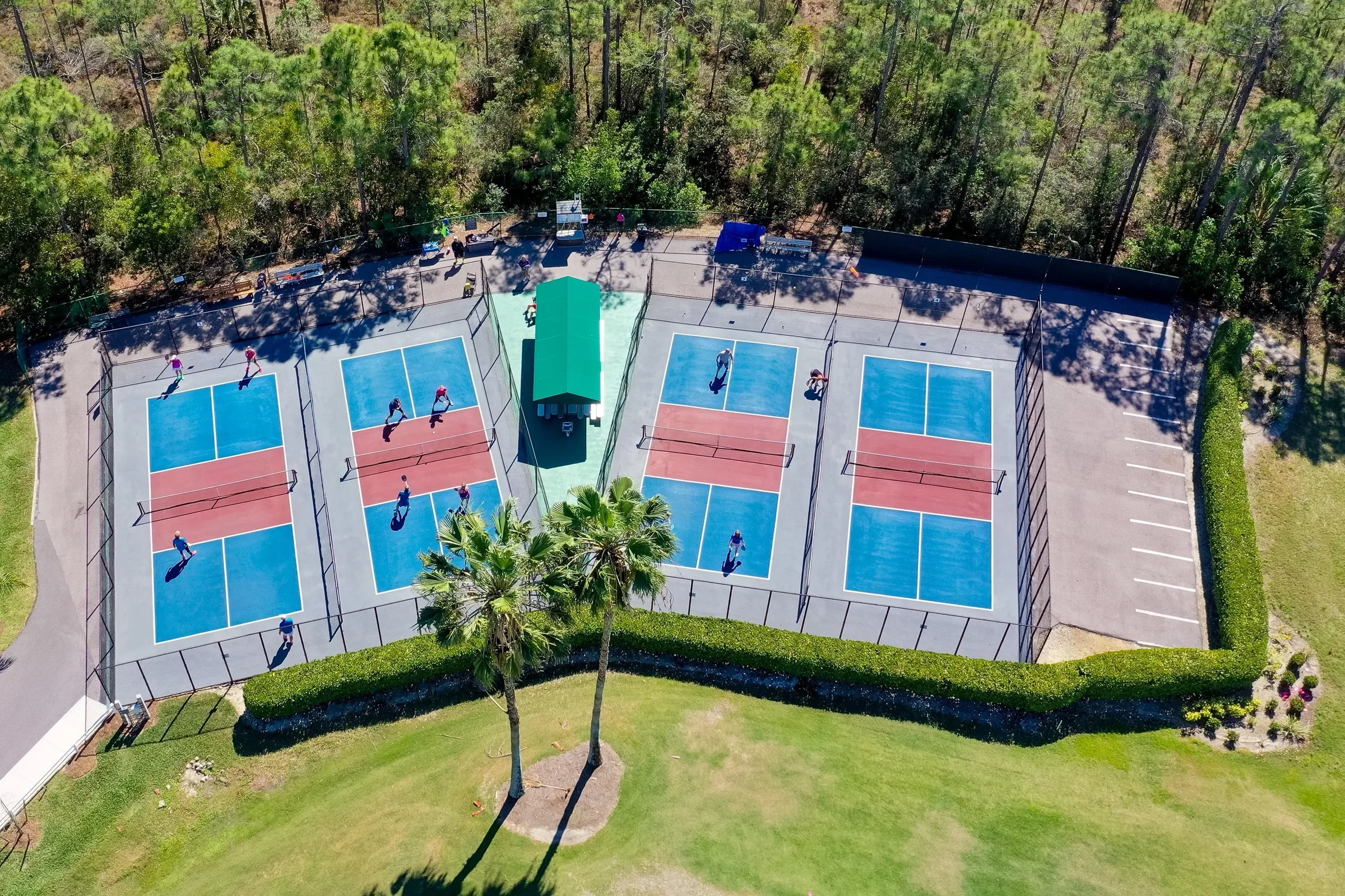 Aerial of the pickleball courts at Herons Glen, North Fort Myers (official club site).