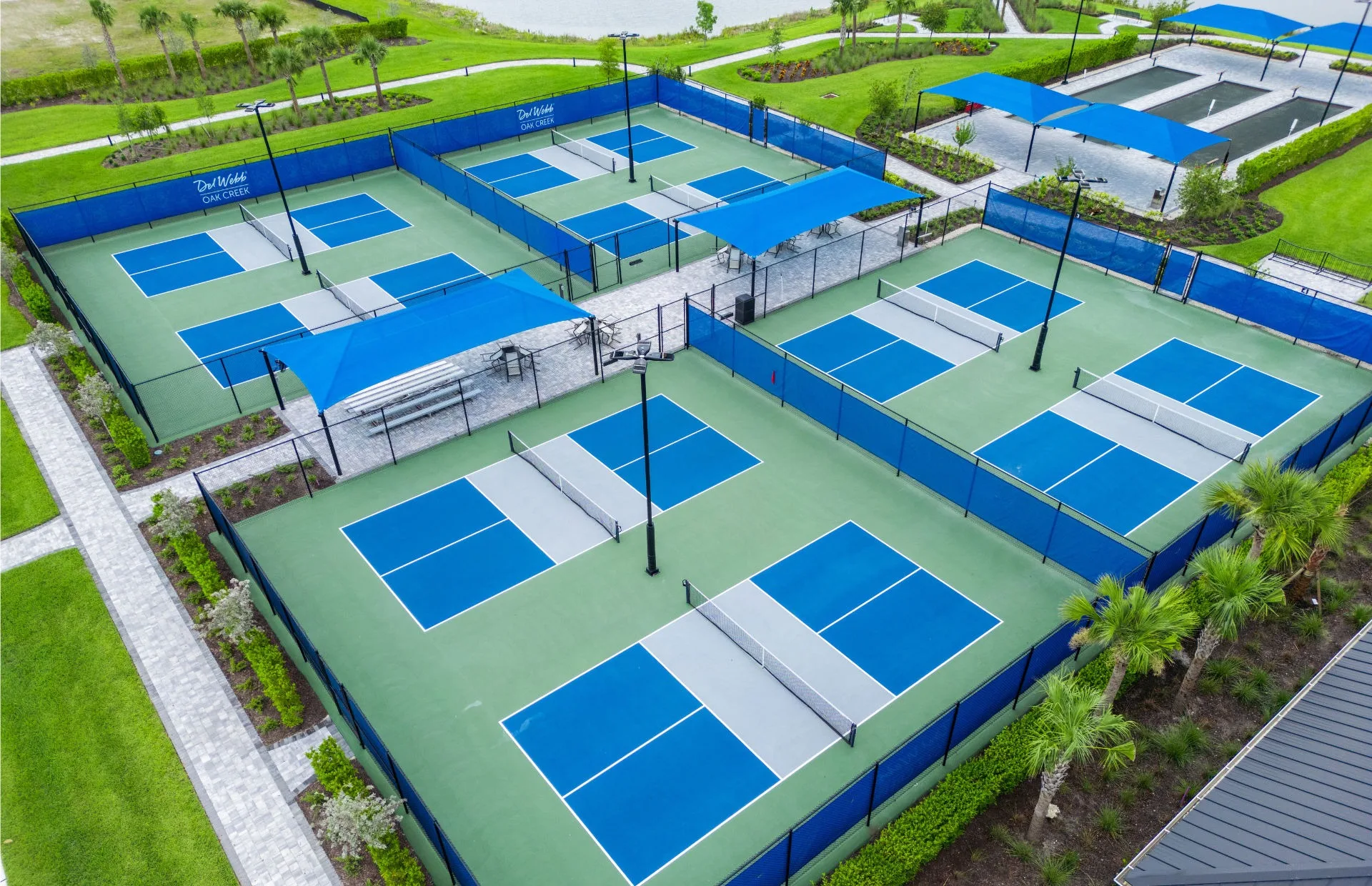 Aerial of the pickleball courts at Del Webb Oak Creek, North Fort Myers (official Del Webb site).