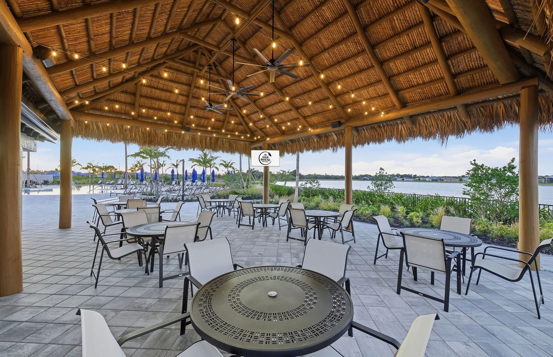 Covered lakeside dining terrace at Del Webb Oak Creek, North Fort Myers (official Del Webb site).