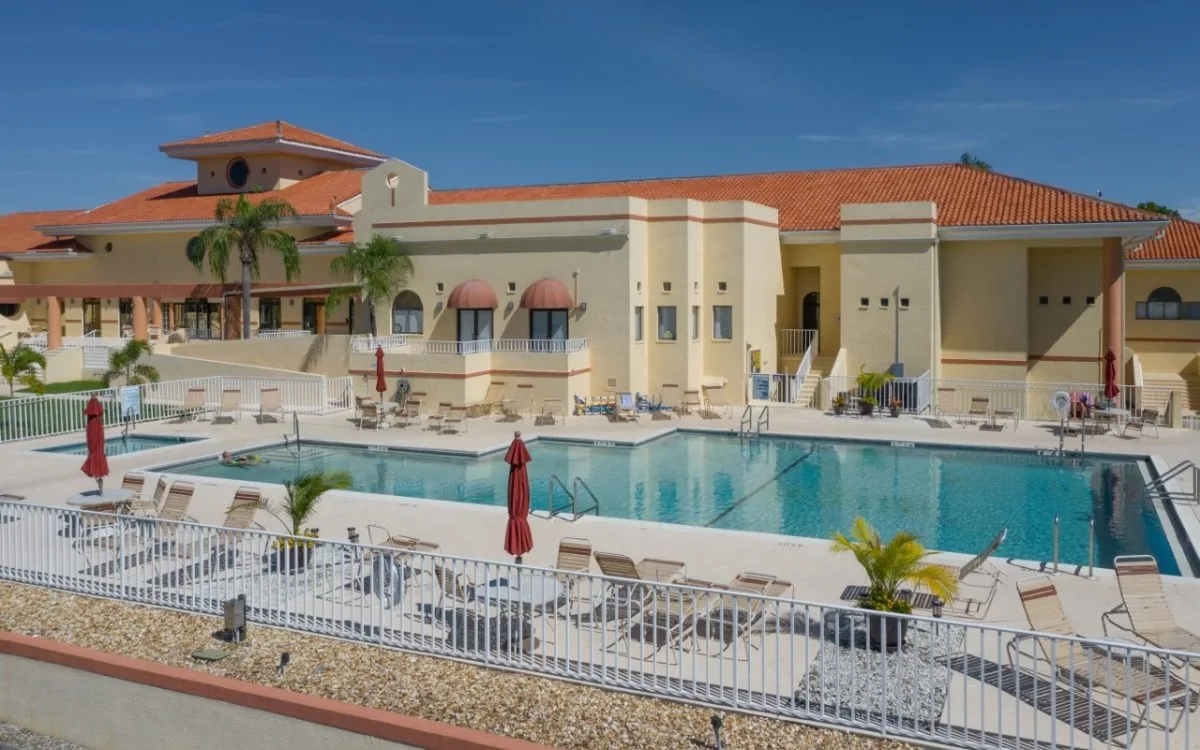 Clubhouse and resort pool at Sabal Springs, North Fort Myers (official HOA site).
