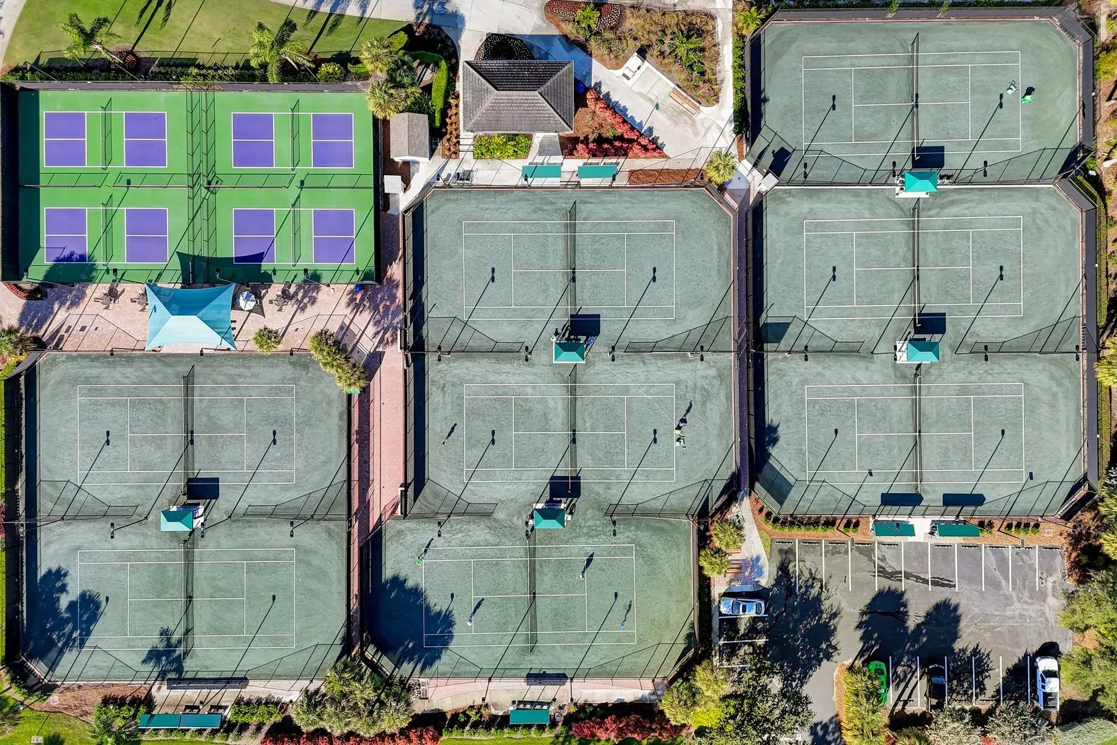 Aerial tennis courts at Heritage Palms (official club site).