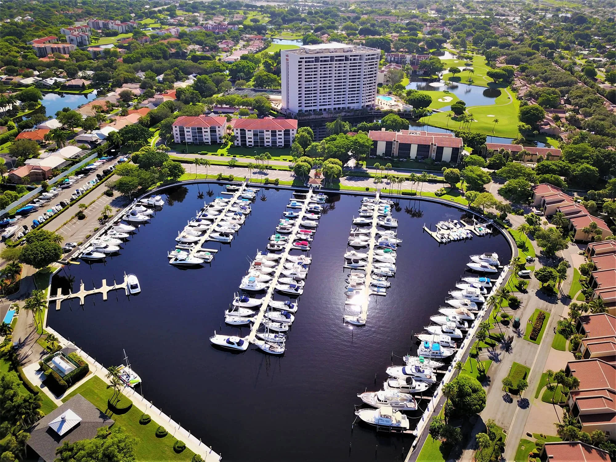 Aerial marina with yachts at The Landings Yacht Golf and Tennis Club (official).