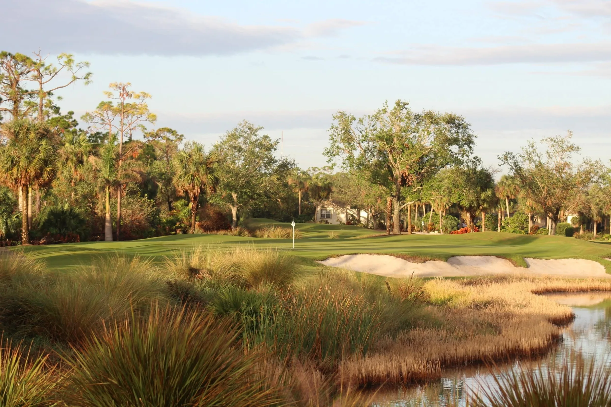 Golf green and native grasses at The Golf Club at Crown Colony, Fort Myers (official community and club sites).