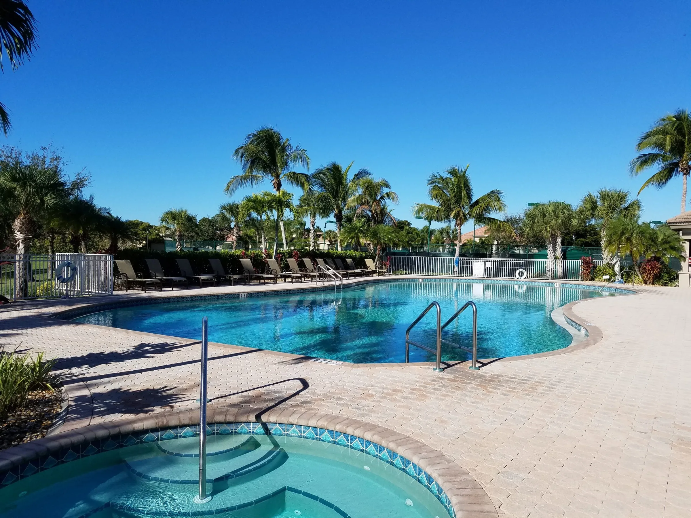 Community pool and spa at Crown Colony, Fort Myers (official community and club sites).