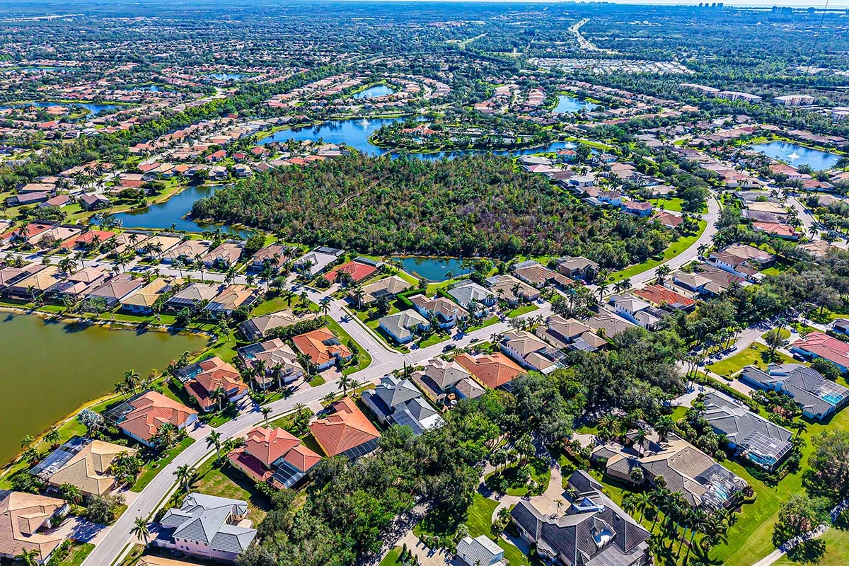 Aerial of Belle Lago homes, lakes, and preserves in Estero.