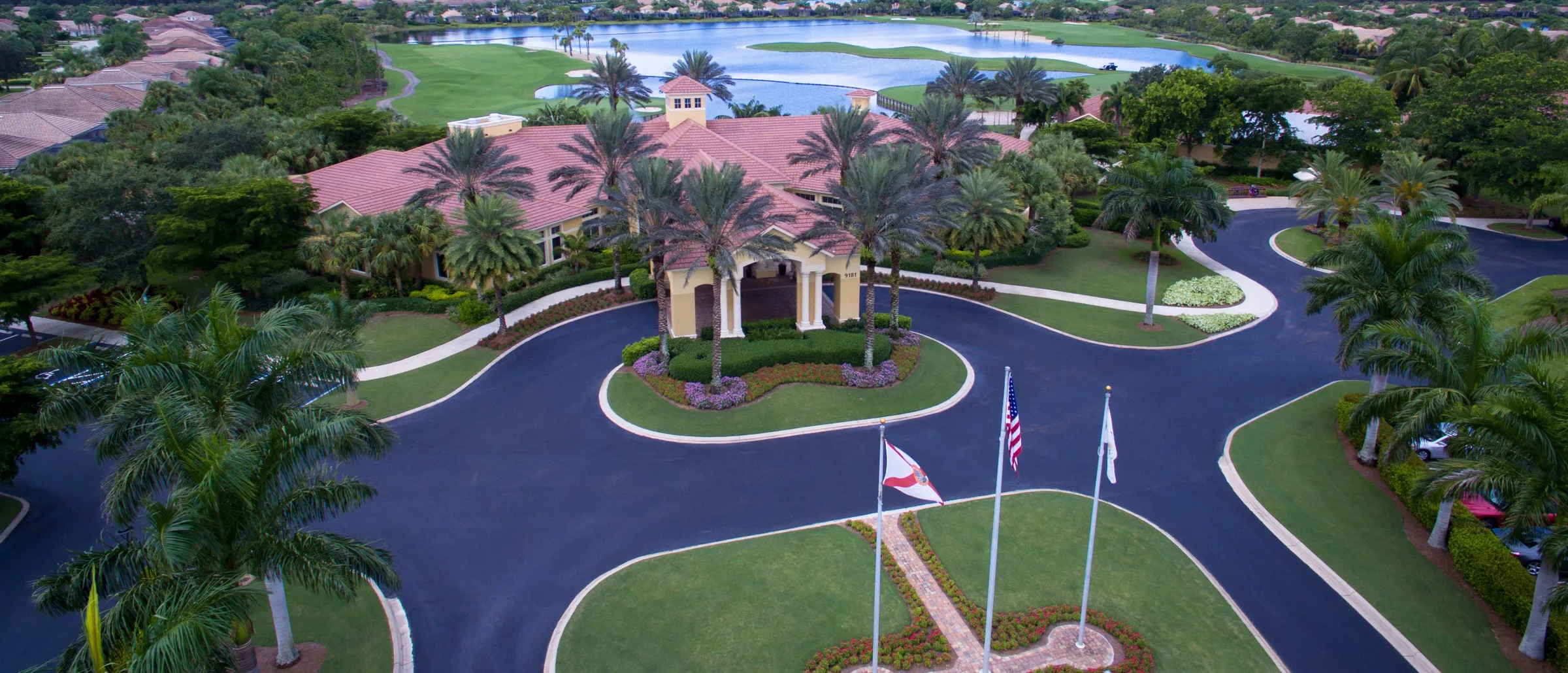 Colonial Country Club clubhouse and circular drive at 9181 Independence Way, Fort Myers.