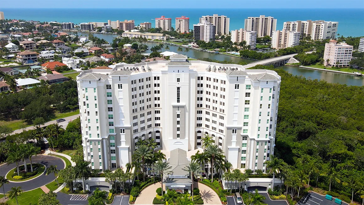Antigua residential tower beside the preserve at The Dunes of Naples.