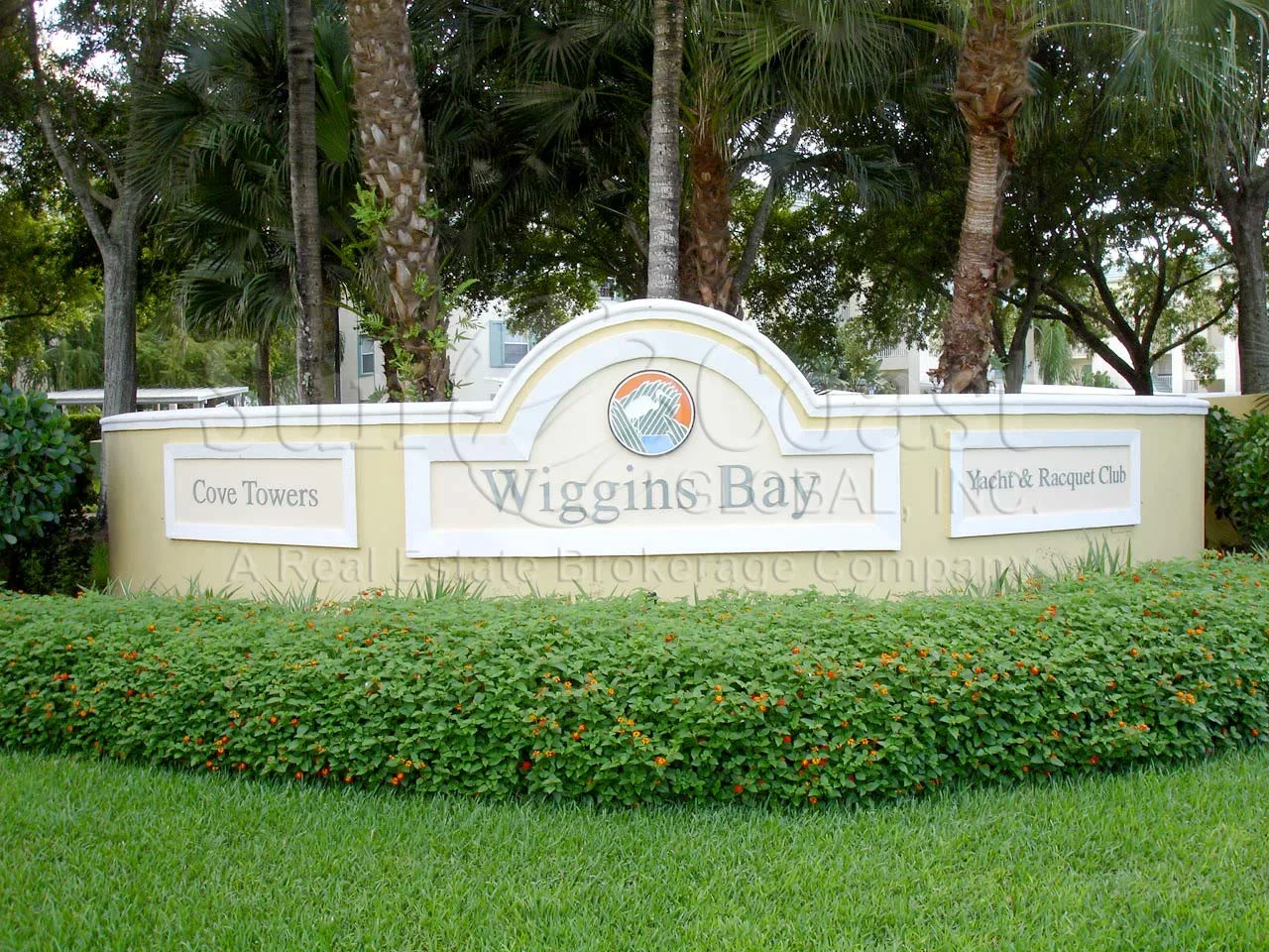 Wiggins Bay entrance monument (Cove Towers / Yacht & Racquet Club)