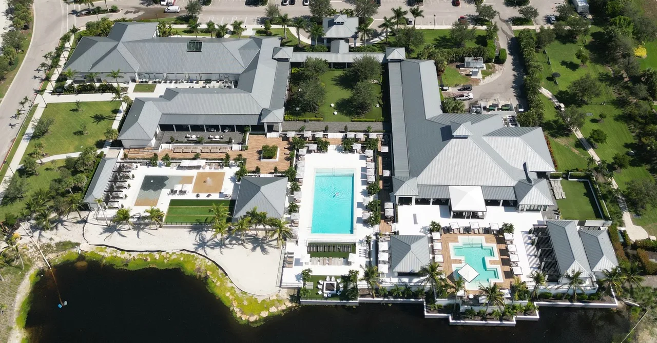 Overhead view of The Club at Kalea Bay amenity center and pools