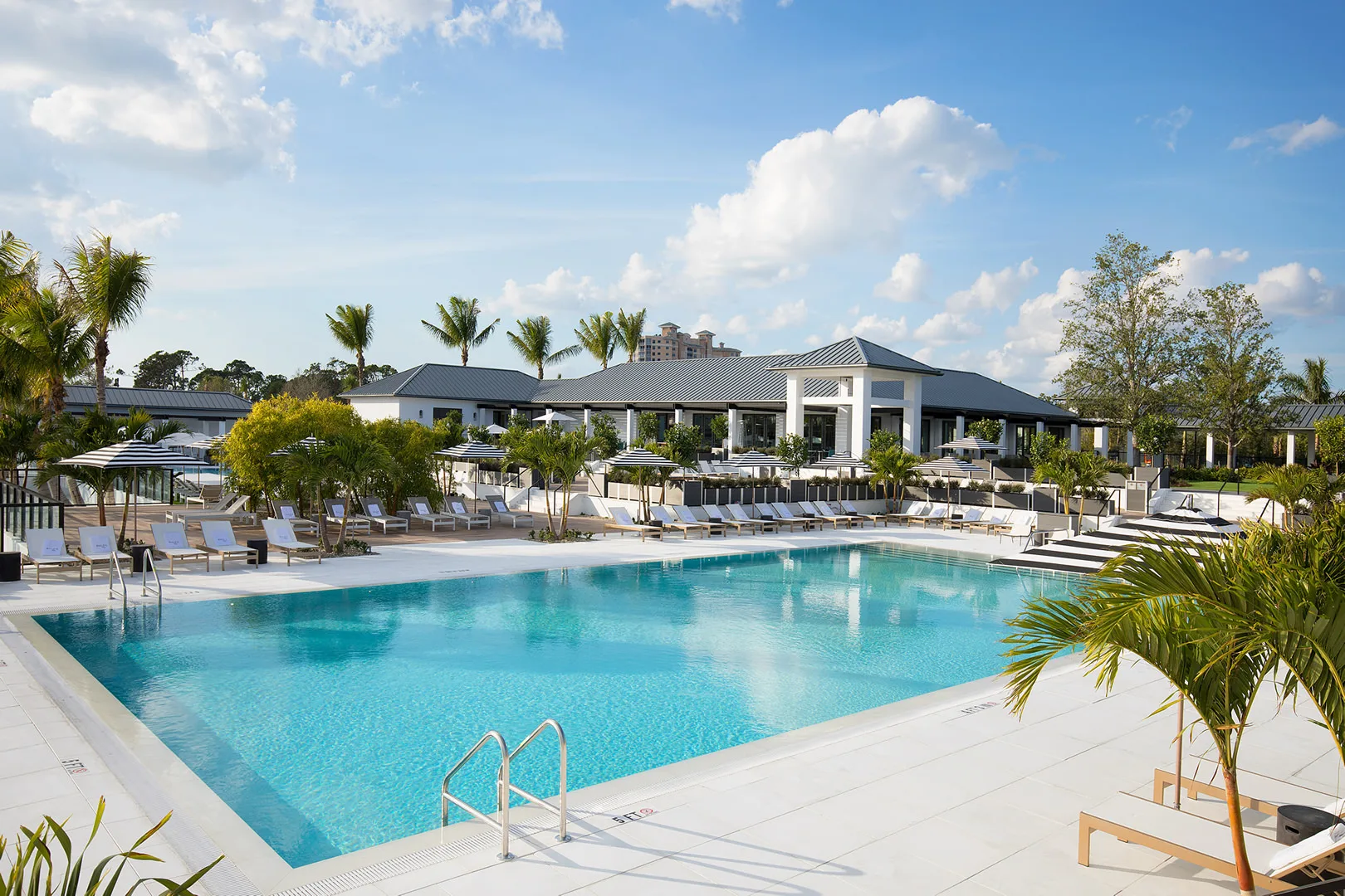 Club pool and clubhouse at Kalea Bay