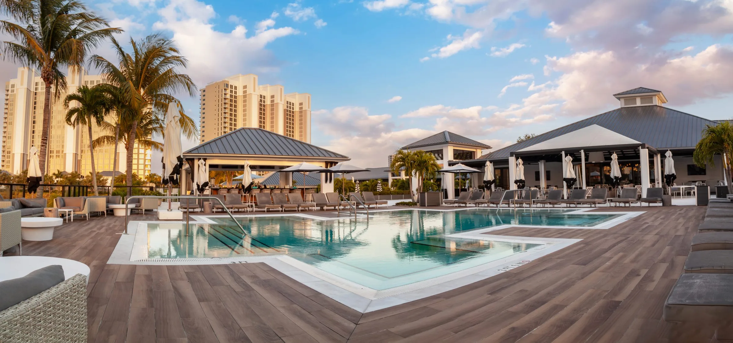 Resort pool deck at The Club at Kalea Bay