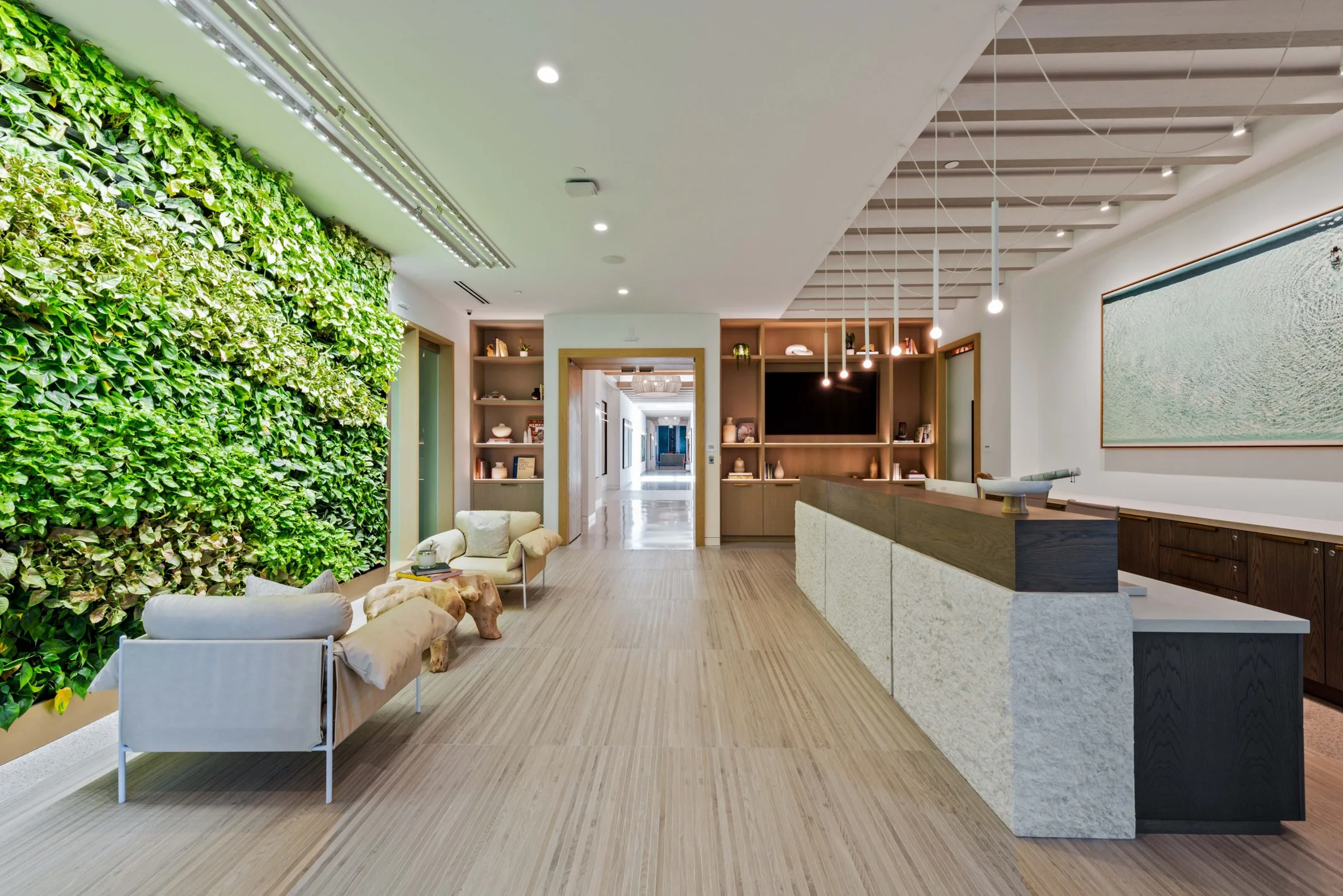 Club reception with a living wall at The Club at Kalea Bay
